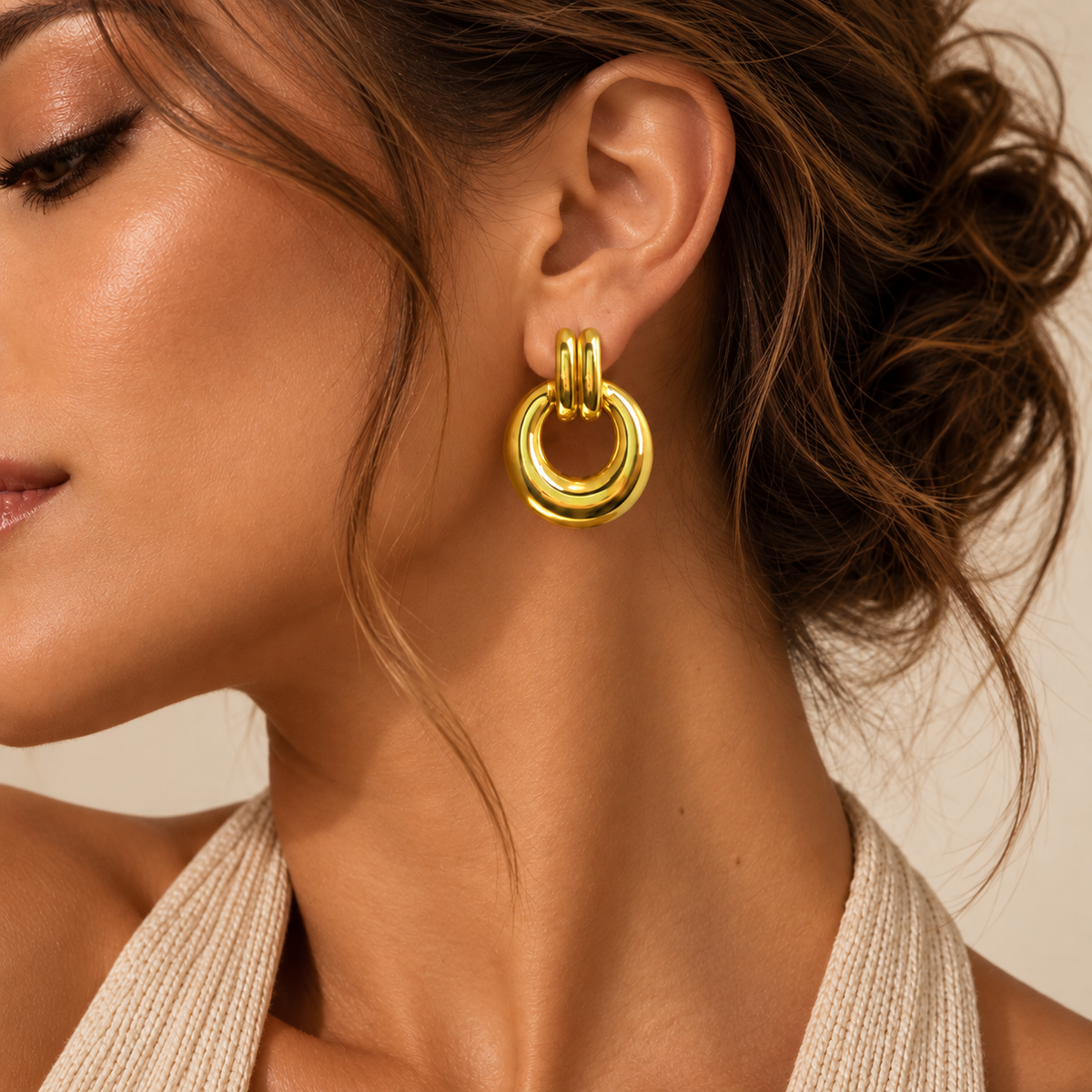 18K gold plated stainless steel statement stud earrings worn by model